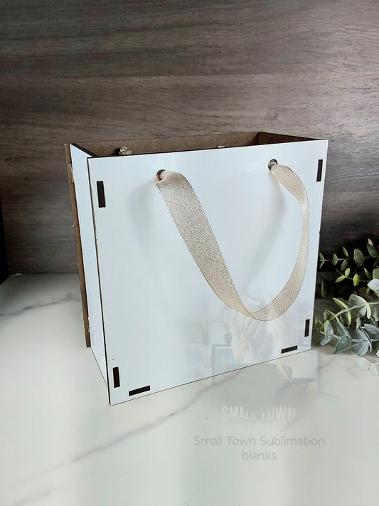 Gift box with holes for choice of ribbon