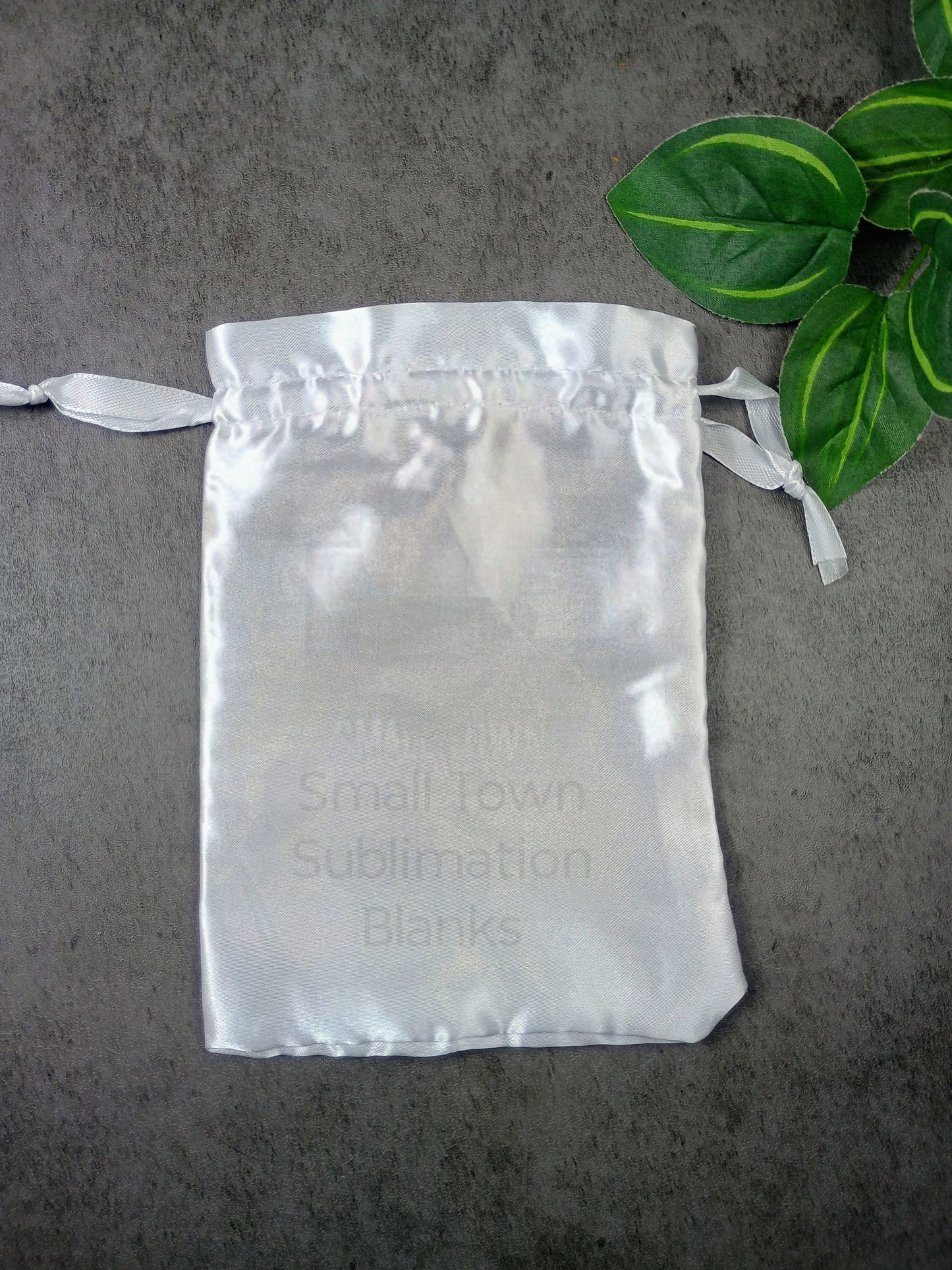 Silky Pull string gift bags.